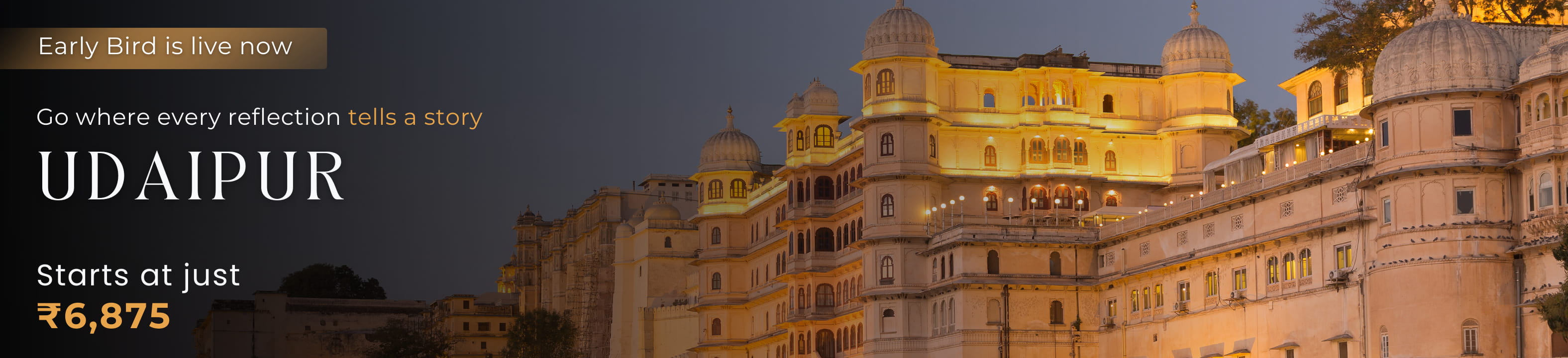 Udaipur travel banner featuring the illuminated City Palace at twilight. Text: Early Bird is live now. Go where every reflection tells a story. Udaipur tour packages starting at just ₹6,875.